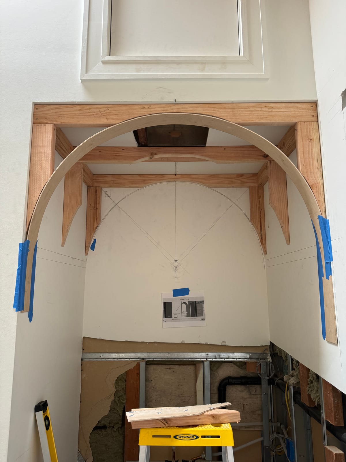 Custom curved arch framing during a commercial build-out at a Portland studio — K&H Construction