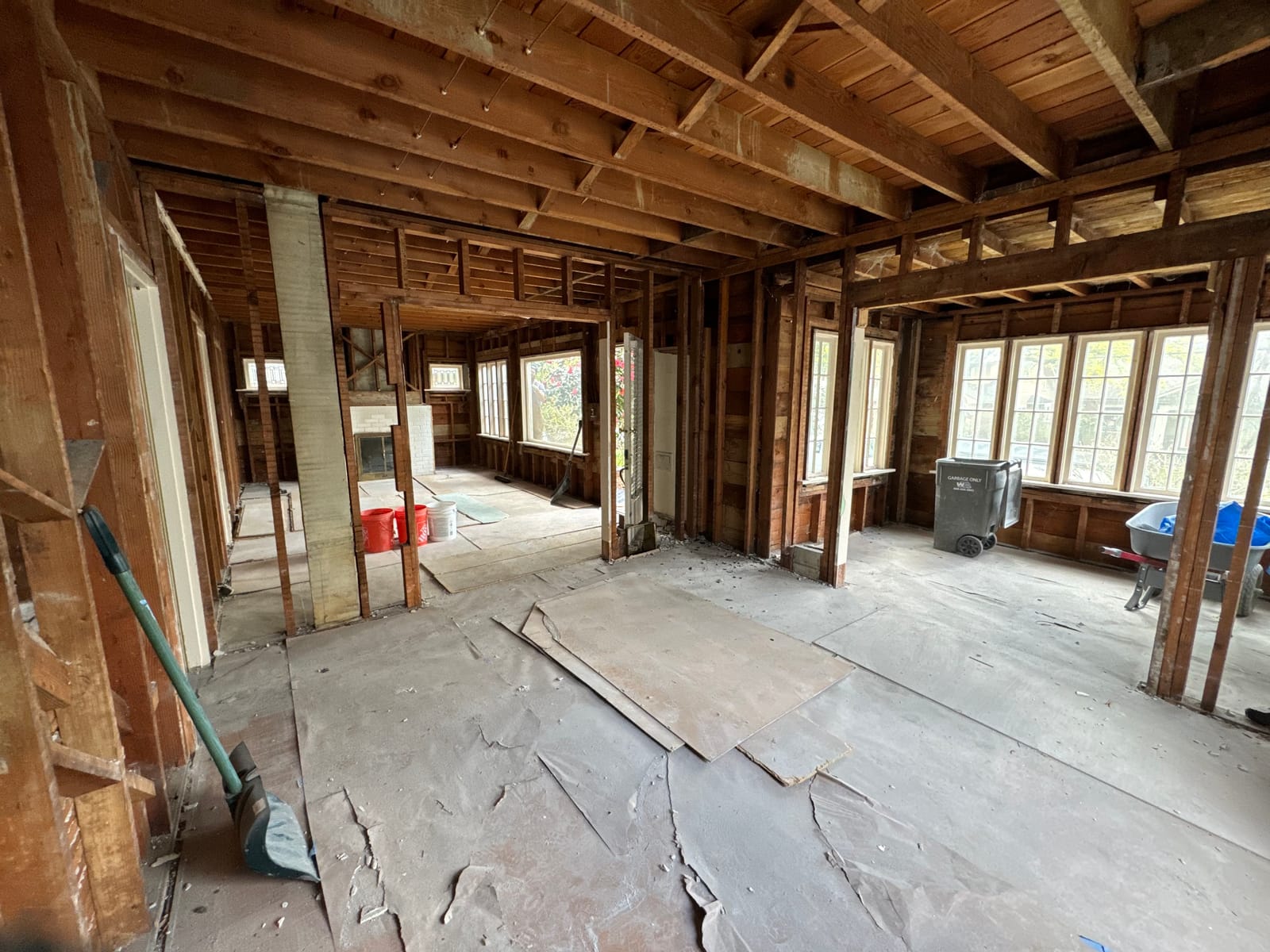 Whole-house remodel in Sabin, NE Portland gutted to the studs, original subfloor exposed — K&H Construction